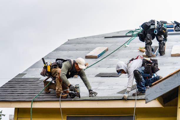 Professional Roofing technician working in Woburn, MA